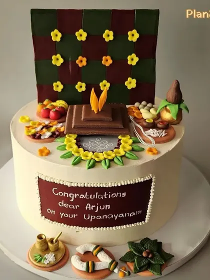 A unique Upanayana (thread ceremony) cake for Arjun. This cake features a 'homa kunda' and all the essential elements of the ceremony, handcrafted from fondant.