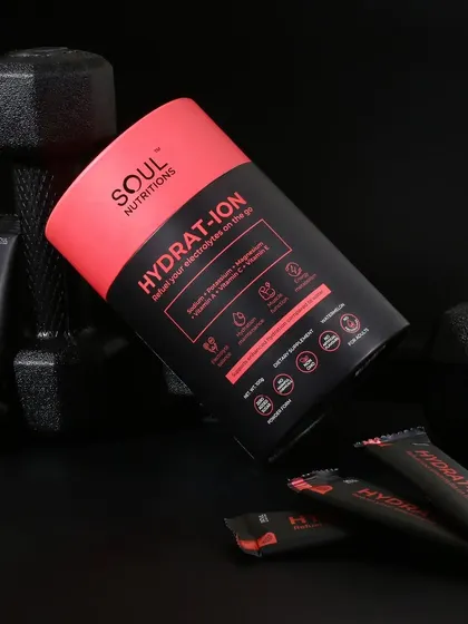 A dark, moody, and powerful shot for the hydration supplement. The use of dumbbells and dramatic lighting gives the product a serious, high performance feel.