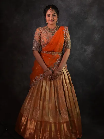 The full lehenga look is perfect for a pre-wedding ceremony. The jewellery is elegant and not too heavy, allowing the bride-to-be to be comfortable.