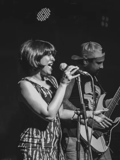 Performing with the prog rock band Rainburn. I enjoy collaborating with other bands as a guest vocalist, bringing my blues and jazz style to different musical genres.