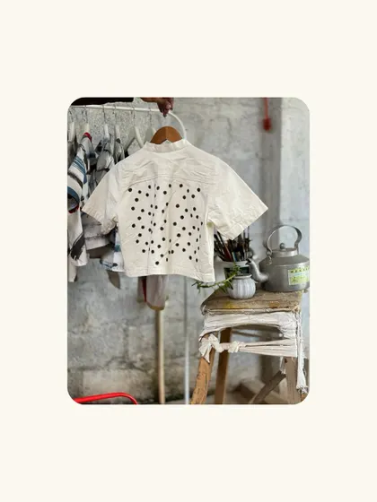 This hand-painted polka-dot top is another piece from our special collection. It's available on a made-to-order basis and can be customized to your preferred size and style.