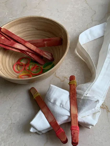 A closer look at the materials provided for a group tie-dye workshop. The setup is simple, making it easy to host these sessions in any location.