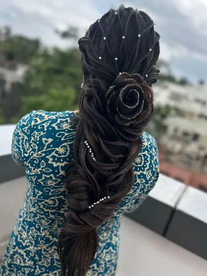 A side profile of the rose braid, demonstrating the volume and structure you'll learn to build.