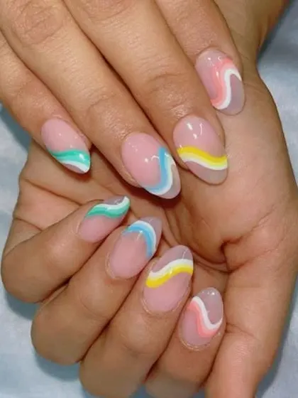 Another view of the playful pastel wave nails.