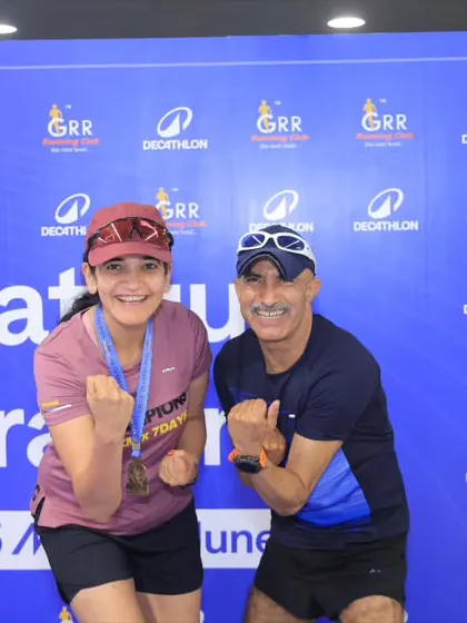 Two finishers from Fatigue Training 4.0, celebrating their hard-earned medals. They beat the heat, silenced the noise, and moved forward.