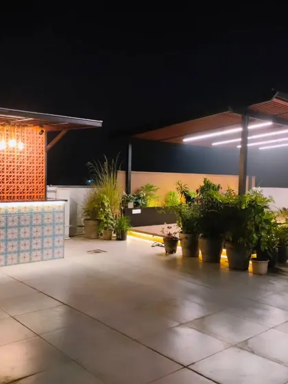 A night view of the completed bar and pergola structures at our Palam Vihar site.