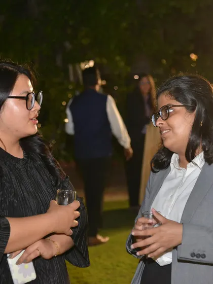 Networking with fellow professionals at the Women's Day event. Building connections within and outside the legal community is an important part of my practice.