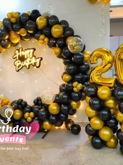 A sophisticated black and gold theme for a 20th birthday. This full ring backdrop is perfect for creating a classy party vibe, complete with matching foil number balloons.