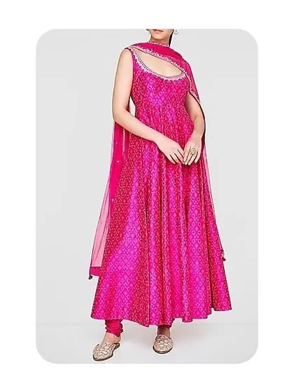 The same Anarkali design as the previous image, shown here in a bright pink. I can often create a design you love in different colors and fabrics, depending on availability and your preference.