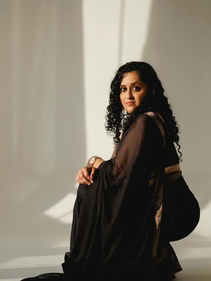 Another portrait from the black saree shoot, showing how the simple, clean makeup looks beautiful in natural light.