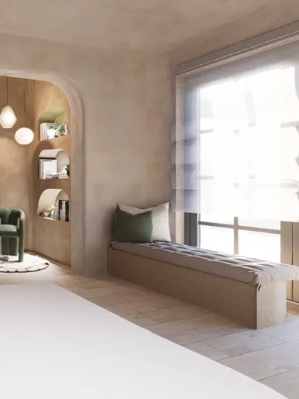 A built-in bench by the window provides a cozy spot for reading or enjoying the view. The entire room is designed with clean, minimal lines to evoke a sense of peace and relaxation.