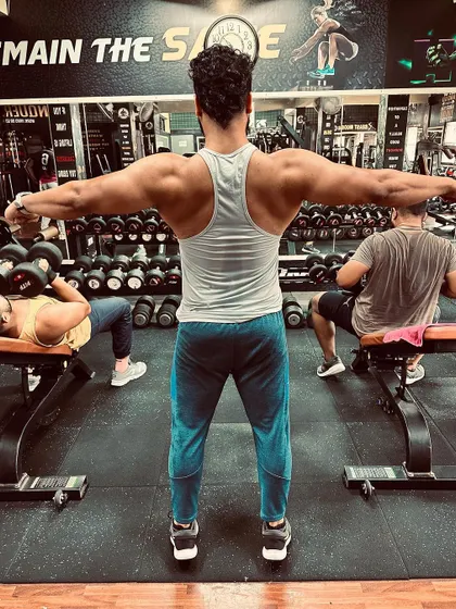 Another angle of the rear delt fly pose. Consistency in posing practice is just as important as consistency in lifting for anyone looking to compete or simply track their progress visually.