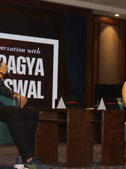Sharing a laugh with Pragya Jaiswal. A relaxed and friendly atmosphere on stage translates to a more engaged and receptive audience.