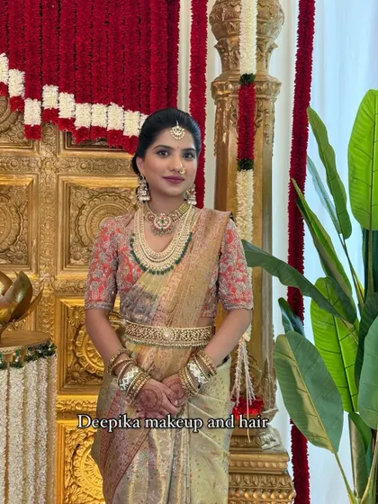 A full-length view of the bride against a grand backdrop, showcasing the complete, regal look I created for her US wedding.