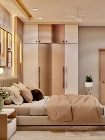 Another view of the luxurious bedroom, showing the full wardrobe with a mix of wood and neutral tones.