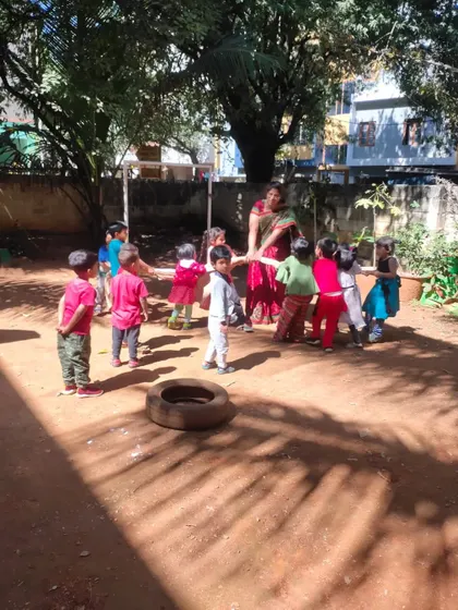 Outdoor games during our Christmas celebration. Playing together in the fresh air is a joyful way to build community and develop gross motor skills.