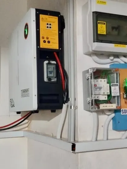 The complete electrical setup for the 5kWh hybrid system in Sullia, Karnataka. It includes the inverter, battery, and safety components like the solar meter and bus bar for a professional-grade installation.
