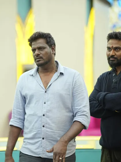 A focused moment with my team member on the set of Bigg Boss Kannada. Teamwork is essential for pulling off these large scale productions.