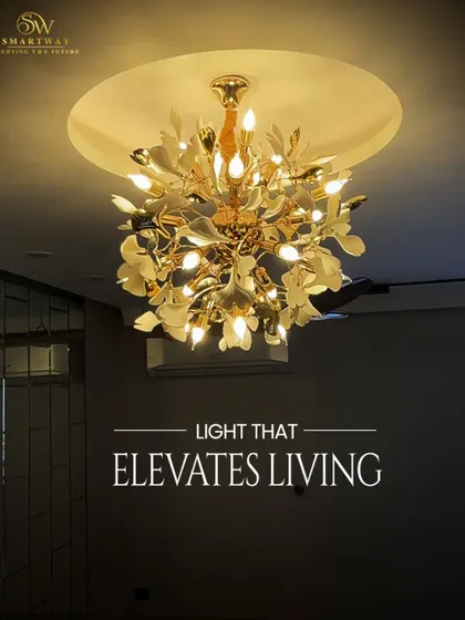 This beautiful gold chandelier with leaf-like details is a classic design that elevates any living space. The warm candle-like bulbs add to its timeless charm.