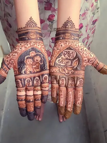 A truly personal design for Rakshabandhan. This custom piece features a portrait of a sister and her brother, with the words 'Raksha Bandhan' and a diya. The names of her brothers are carefully written on each finger.