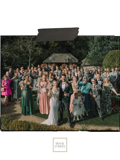 An artistically edited version of the group photograph, highlighting the collective happiness of everyone present at the Bibury wedding.