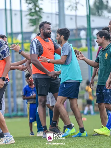 Handshakes and smiles are exchanged between players after a game. This is what it's all about: competition, respect, and building connections.