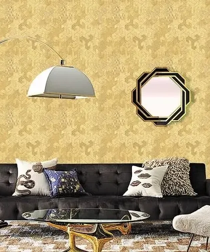 A living room mockup with a gold version of the interlocking geometric wallpaper, creating a luxurious accent wall.