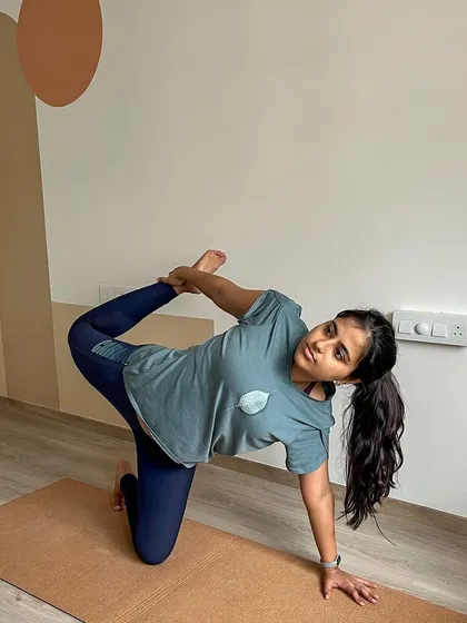 Holding the kneeling backbend, focusing on the stretch in the front of the body. Poses like this are excellent for improving spinal flexibility and are a regular part of my Hatha yoga sessions.