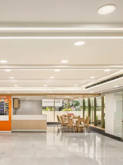 The interiors of Fortis Hospital in Ludhiana are reimagined to combine functionality with a soothing spatial experience. The waiting area uses comfortable, modern furniture and biophilic elements to evoke a sense of calm.