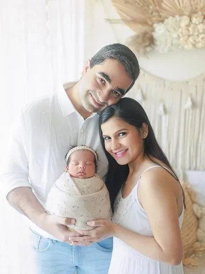 A happy family of three. This portrait, taken against a lovely boho-style backdrop in my studio, is full of warmth and joy.