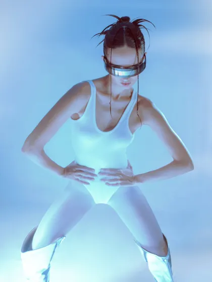 A futuristic fashion concept using a clean background, cool lighting, and metallic accessories. This demonstrates my ability to create sleek, modern, and high-impact visuals.