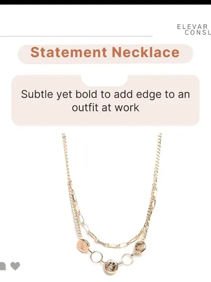 A statement necklace that is subtle yet bold can add a creative edge to a simple work outfit, showing personality while maintaining professionalism.