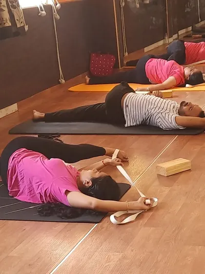 A yoga strap is an extension of your arms. Here, we are using it for a supine leg extension, which is an excellent and safe way to increase hamstring flexibility and release lower back tension.