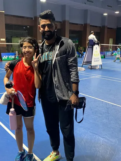 With Nandini on the court during the Haryana State Championship in 2022. Supporting my players through every match is crucial.