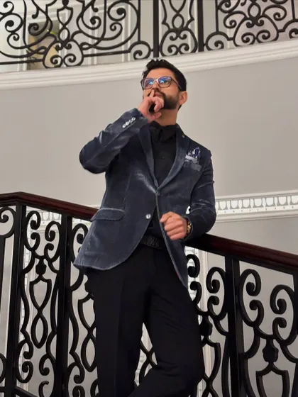 A thoughtful pose on the staircase. It shows a more serious, contemplative side to my personality.