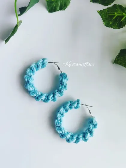 A beautiful pair of macrame spiral knot hoop earrings in a lovely sky blue. These are lightweight, trendy, and comfortable enough to be worn all day.