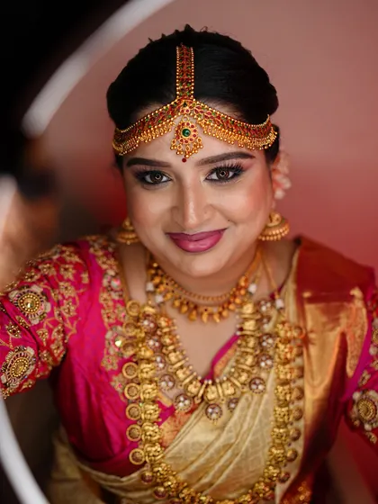 A ring light portrait showing the flawless finish of the makeup. I ensure the makeup is picture-perfect from every angle, highlighting the bride's best features.