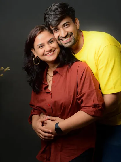 A warm, happy hug from behind. This kind of casual and affectionate pose results in very natural and heartfelt couple portraits.