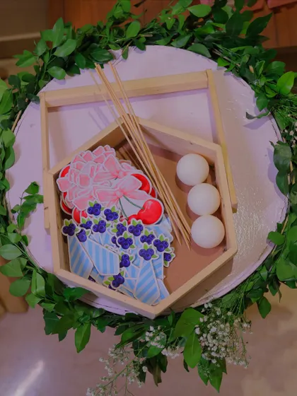 Another view of the DIY activity kit, showing the beautiful custom-printed cards and craft supplies, all arranged in a neat wooden tray.