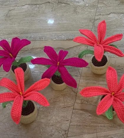 A vibrant bulk order of five lily-style flower pots in shades of fuchsia and coral. I love when customers choose bright, bold colours.