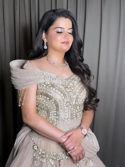 A close-up of this bride's elegant Sangeet makeup. The focus is on the soft, blended eyeshadow and the radiant, flawless skin.