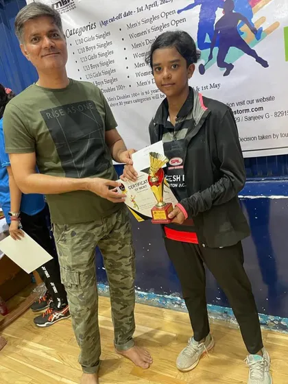 Anriya Singh receiving her runner-up trophy at the Shuttle Storm tournament. Her consistent performance is inspiring.