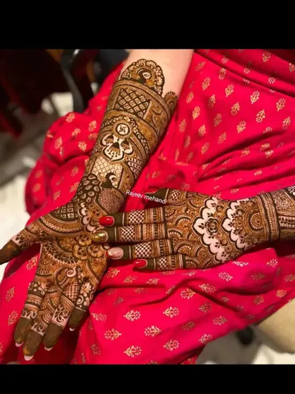 A full view of a bridal design with a swastika for good luck and beautiful peacocks, set against a backdrop of delicate patterns.