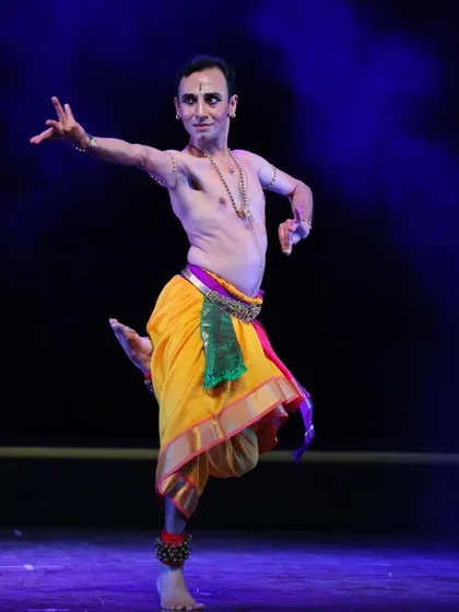 In a moment of dynamic movement from "Sharanagathi," I explore the theme of surrender. This solo presentation combines intricate footwork with expressive storytelling to convey a deep spiritual journey.