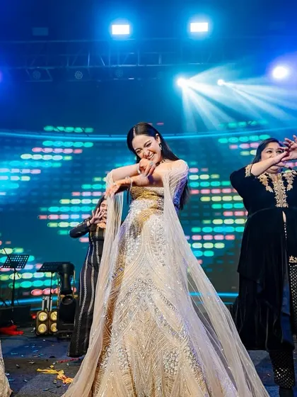 A graceful moment from a group performance. We choreograph routines that have moments of elegance as well as high energy, showcasing a range of styles.