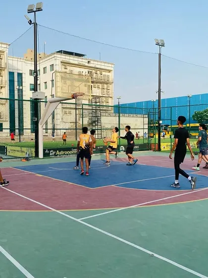 A typical evening practice with players fully engaged in a team game.