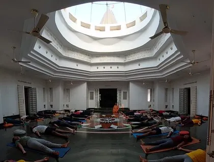 Proper relaxation is as important as proper exercise. Students practice Savasana in a beautiful hall in Gurgaon, absorbing the benefits of their asana practice under my guidance.