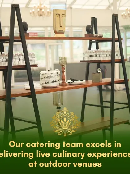 Our catering team excels at delivering live culinary experiences in outdoor venues. This image shows a stylish beverage and water station, part of a larger, well-organized setup.