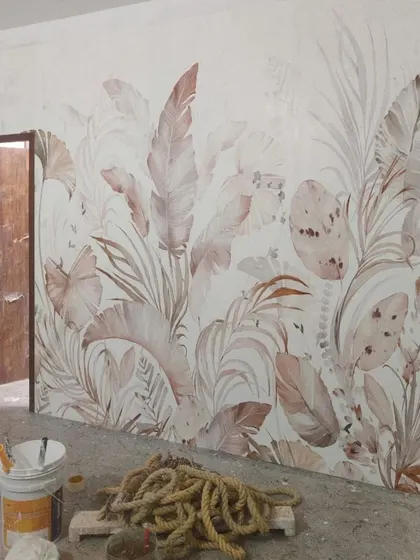 A work in progress. This large-scale botanical mural in soft, earthy tones is being installed to create a subtle yet impactful feature wall.