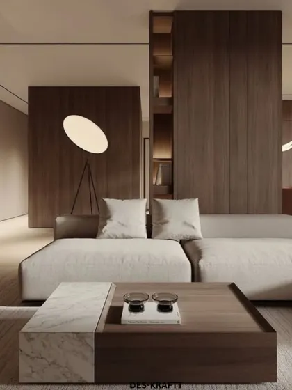 A detail shot focusing on the low-profile sofa and the bespoke coffee table, which combines a rich wood frame with a practical marble inlay for a touch of mixed-material elegance.